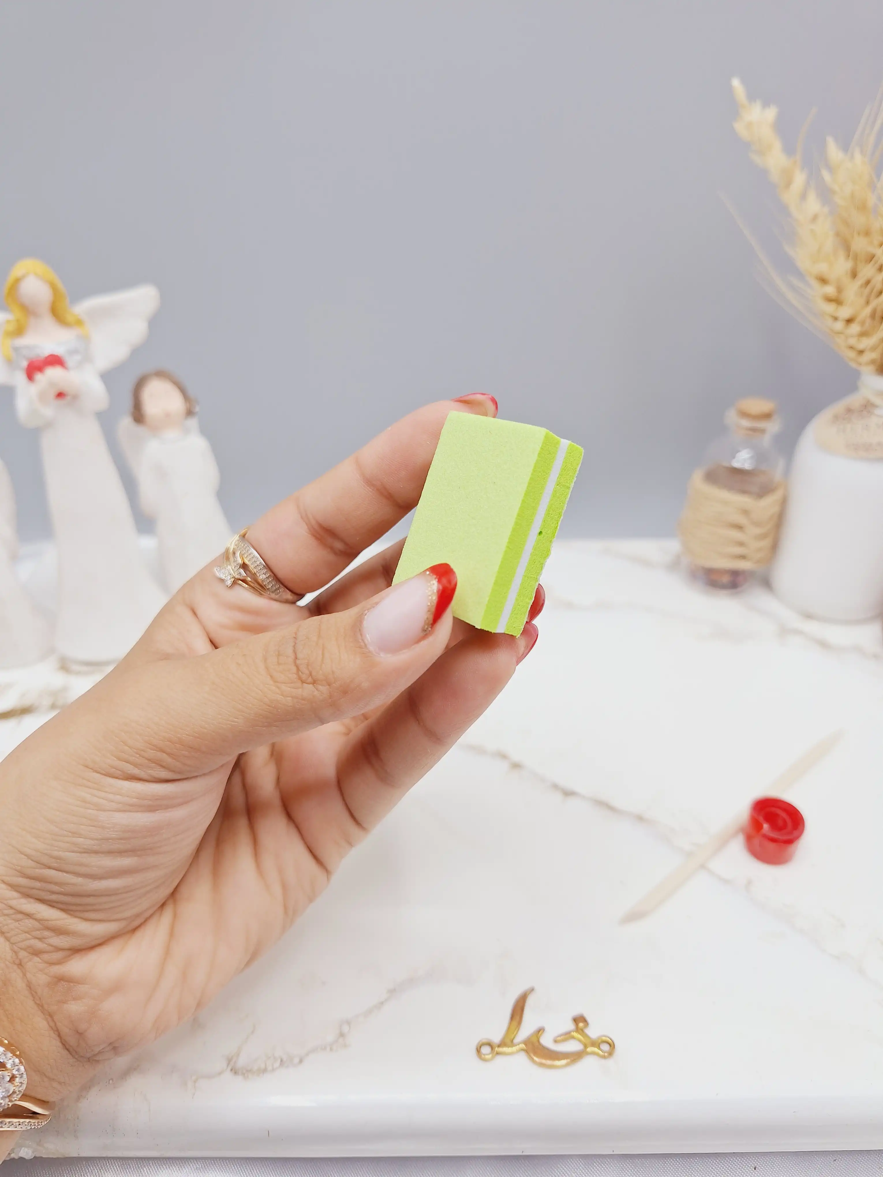 ناخن مصنوعی با مواد کاشت درجه 1 رنگ طلایی مدل آیس ژل شاین دار